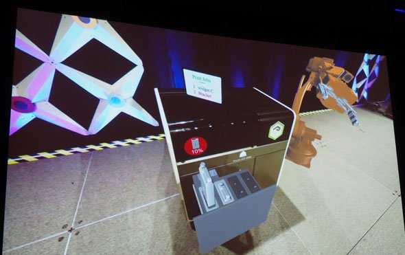 HoloLensを通じて見える世界。実際の3Dプリンタに対して、仮想的な3Dアニメーション表示したり、材料の残量やプリントジョブの状態といった情報をリアルタイムに可視化したりできる
